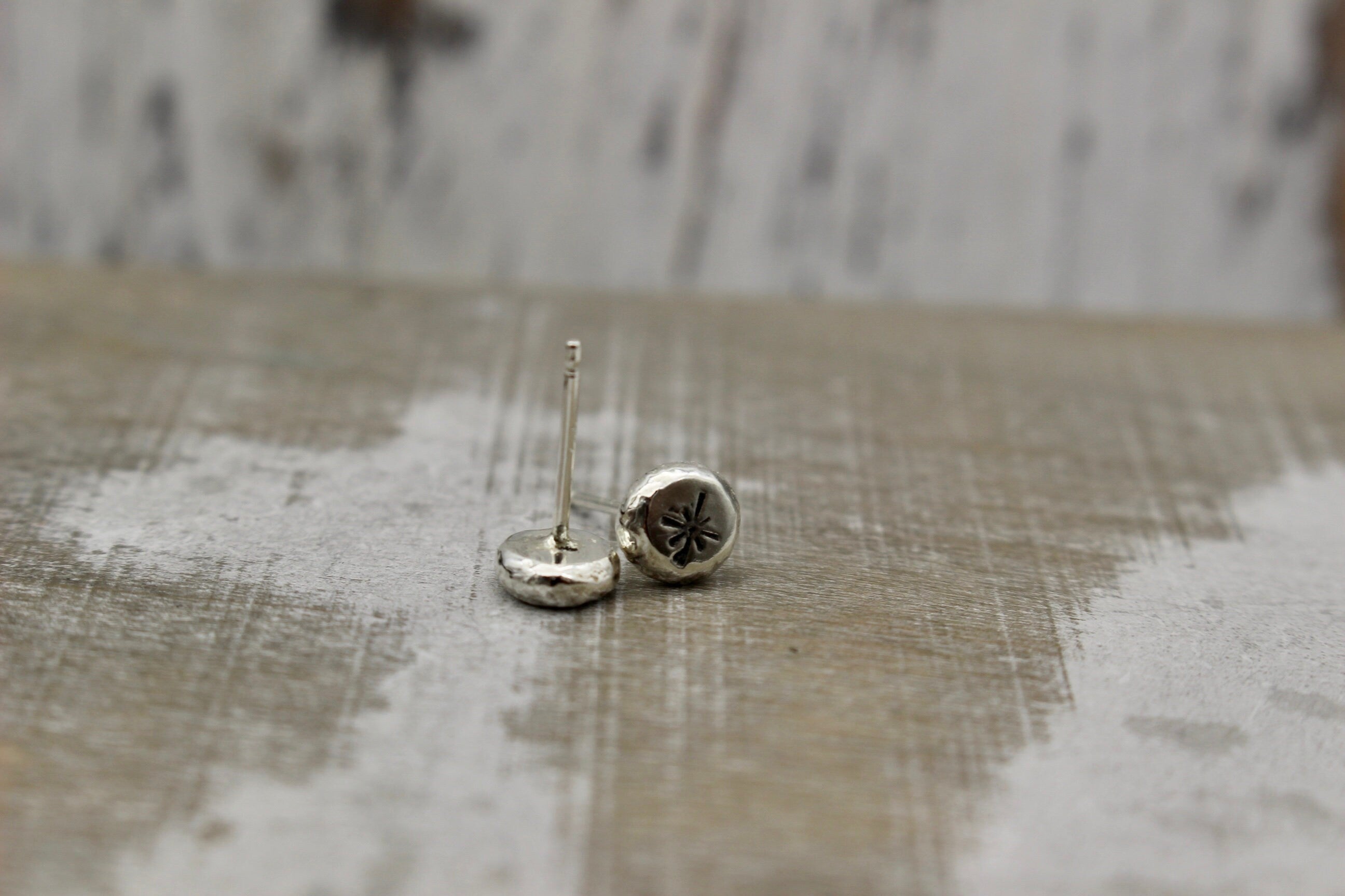 Small silver star studs