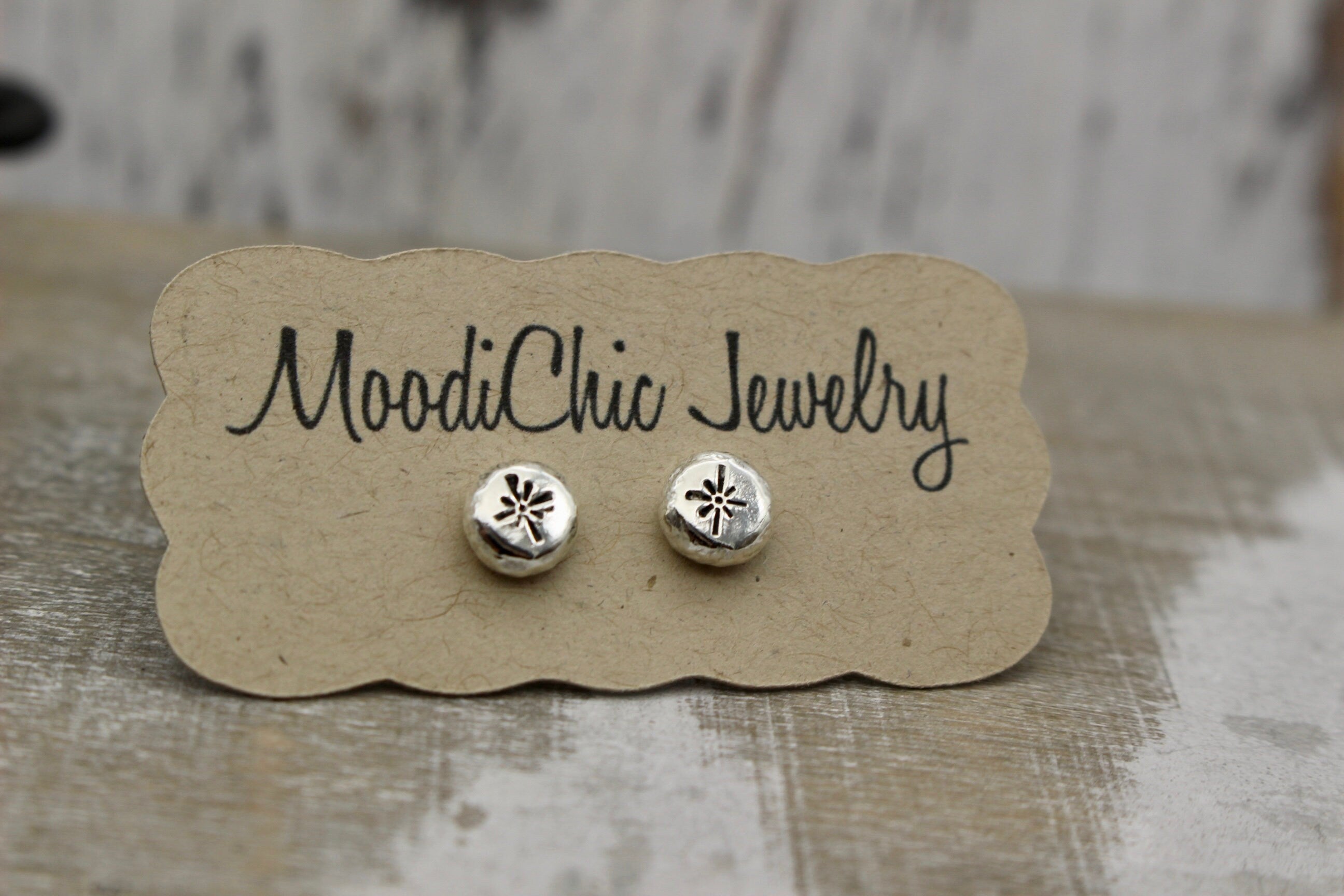 Small silver star studs