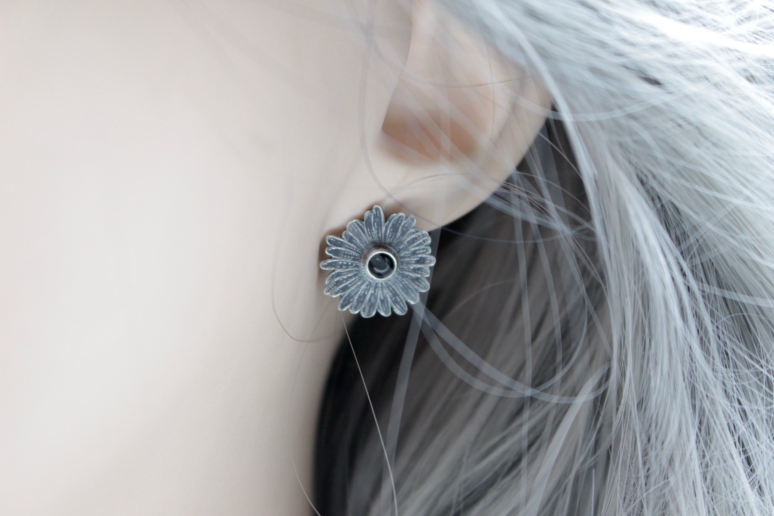 Sterling silver daisy stud earrings